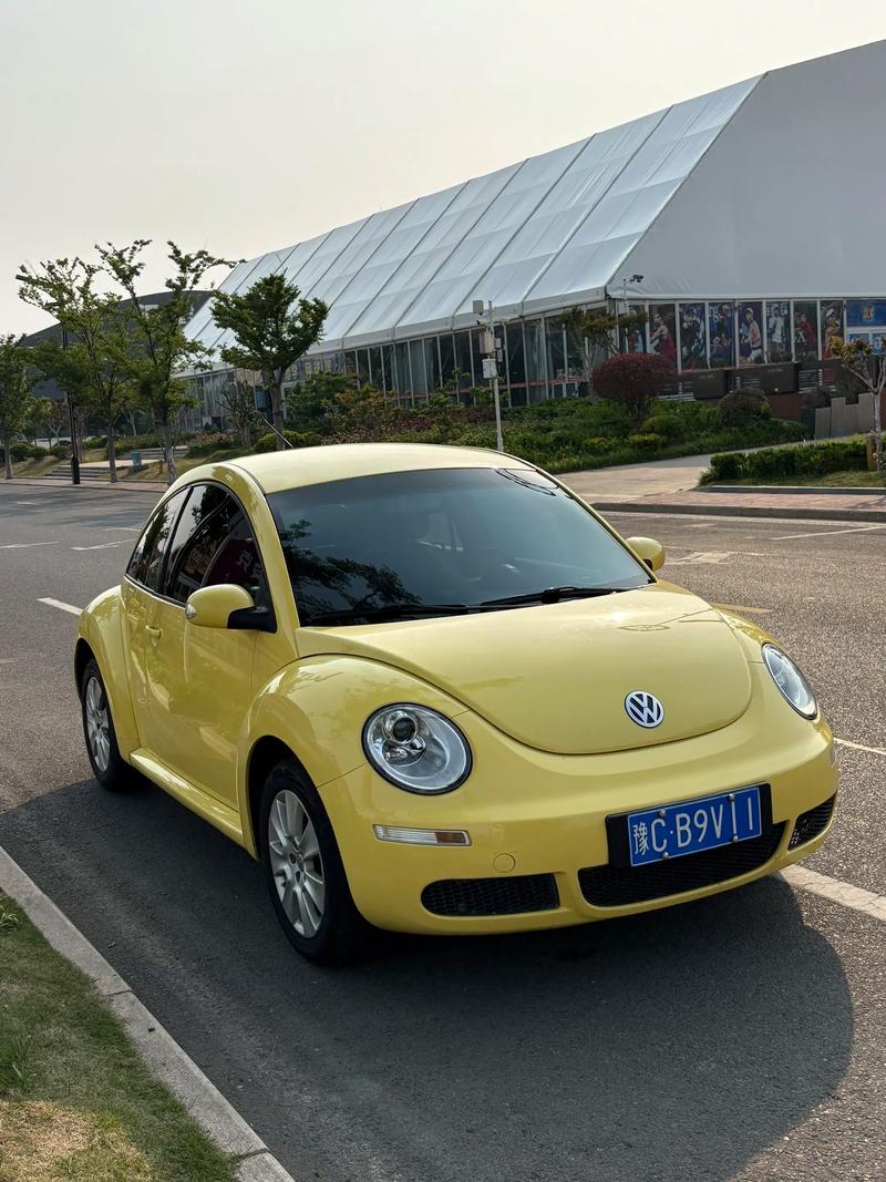 大众像甲壳虫的车型,类似大众甲壳虫车型车标fi